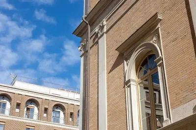 a brick building with a window on the side of it at Piazza Navona Lovely Apartment in Rome