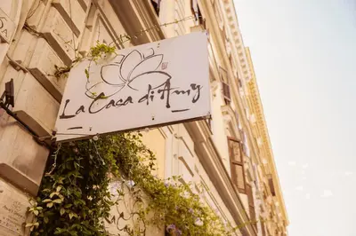 a sign on the side of a building at La Casa Di Amy in Rome