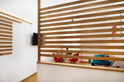 a wooden wall in a room with a table at Ciao Bella Stella in Rome