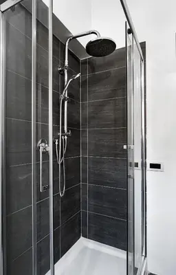 a shower with a glass door in a bathroom at Ciao Bella Stella in Rome