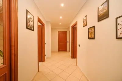 a corridor of a house with a hallway at Midnight in Vatican in Rome