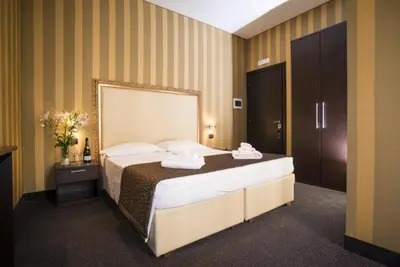 a bedroom with a large bed in a room at AS Planet in Rome