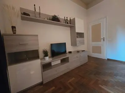 a kitchen with a sink and a stove top oven at Casa Tua a Porta Maggiore in Rome