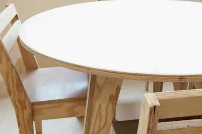 a wooden table and chair with a white table at Testaccio Old Rome Apartment in Rome
