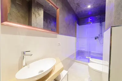 a bathroom with a sink and a shower and a toilet at Hotel Vespasiano in Rome