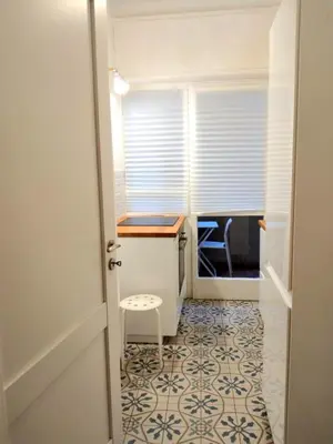 a room with a desk and a table and a chair at RoRo Roma in Rome