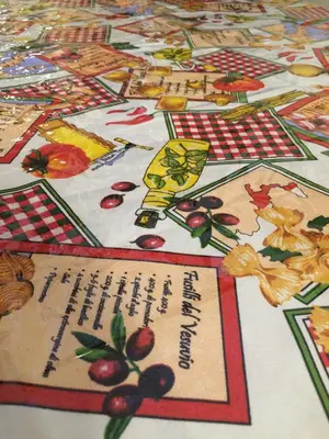 a table with a table cloth with fruit on it at Sweet Roman Dream in Rome