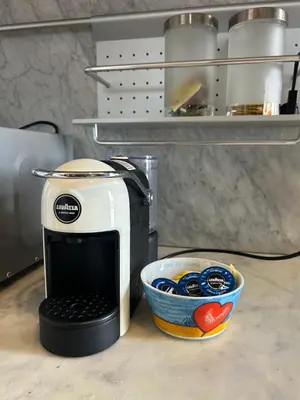 a coffee maker sitting on a counter in a kitchen at Appartamento con Terrazza vicino Gemelli e Vaticano in Rome