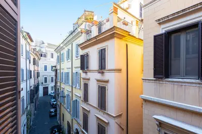 a view of an alley between two buildings at Rental in Rome Navona Loft in Rome