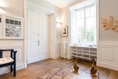 a room with white walls and a window at Villa Michelangelo Deluxe in Rome