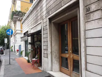 a building with a door on the side of a street at Vatican Relais Rome in Rome