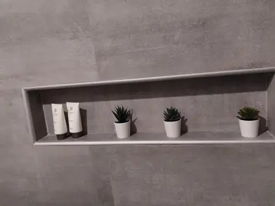 a shelf with potted plants on a wall at Apartment Rome 18 in Rome