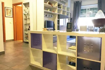 a office with a desk with a computer on it at The Voice of the Pope in Rome