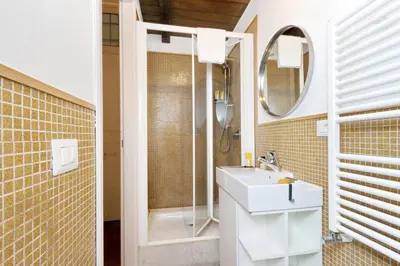 a bathroom with a sink and a shower at Pantheon - Argentina Luxury in Rome