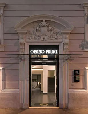 an entrance to an office building with a sign on it at Orazio Palace Hotel in Rome