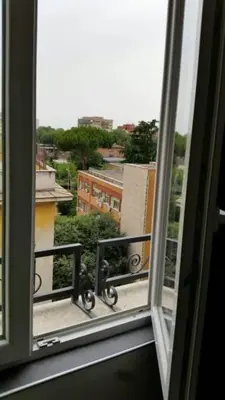 an open window with a view of a city at B&B Buongiornoroma in Rome
