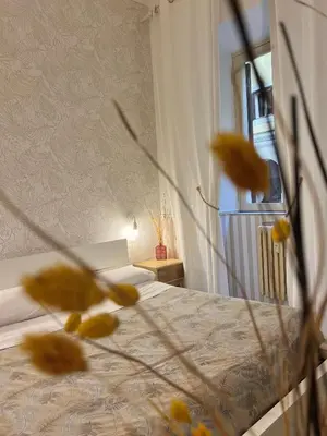 a bedroom with a bed and a window at Eufonia Vatican Days in Rome