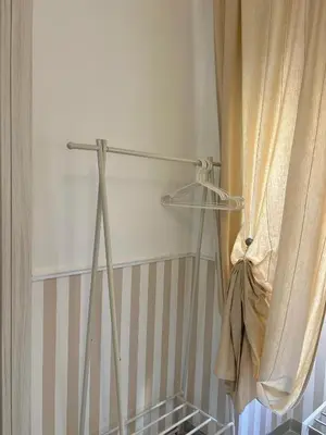 a room with a shower curtain and a curtain at Eufonia Vatican Days in Rome