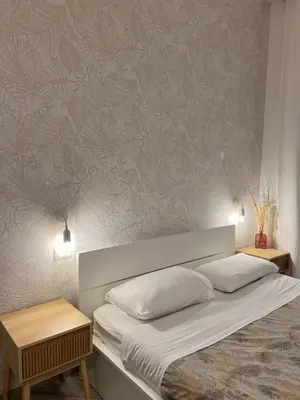 a bed with two pillows on it in a bedroom at Eufonia Vatican Days in Rome