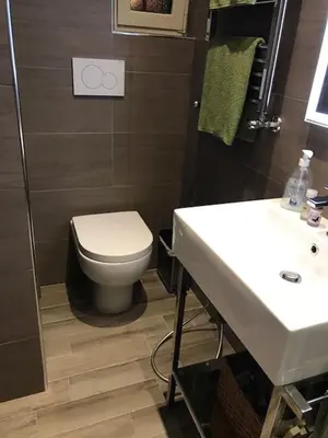a bathroom with a toilet and a sink at Rome Studio Rental in Rome
