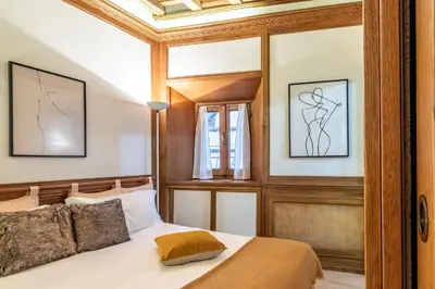 a bedroom with a bed and a window at Spagna Historical by Spanish Steps in Rome