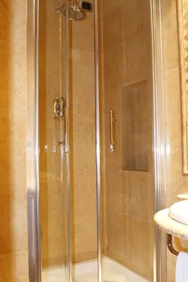 a shower with a glass door in a bathroom at Hotel Villa Pinciana in Rome