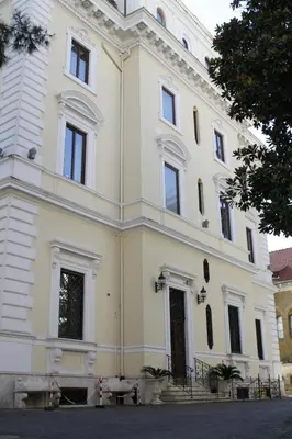 a large white building with a lot of windows at Hotel Villa Pinciana in Rome