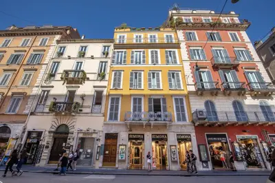 a group of buildings on a street in a city at Stay Inn Rome Via Del Corso in Rome