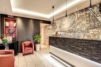 a bar in a restaurant with a map on the wall at Trevi 41 Hotel in Rome