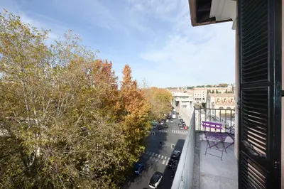 a view of a city street from a balcony at Fontana Più Stella in Rome