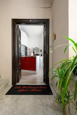 an open door in a room with a counter at Cola Di Rienzo Suite Guest House in Rome