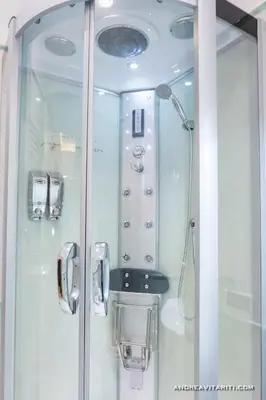 a bathroom with a toilet and a shower and a sink at Central Domus Roma in Rome