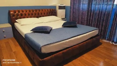 a bed with two pillows on it in a bedroom at Host Roma in Rome