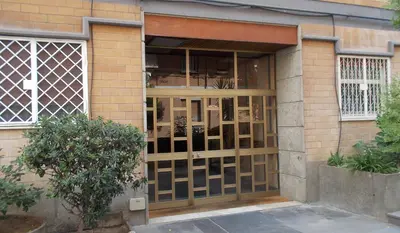 a front door of a building with glass at Roma Tourist House in Rome