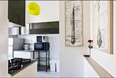 a kitchen with a stoveasteryasteryasteryasteryasteryasteryasteryasteryasteryasteryastery at Vatican View Apartment in Rome