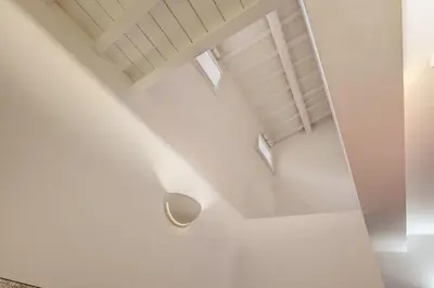 a room with white walls and a white ceiling at Campo de' Fiori Stylish White in Rome