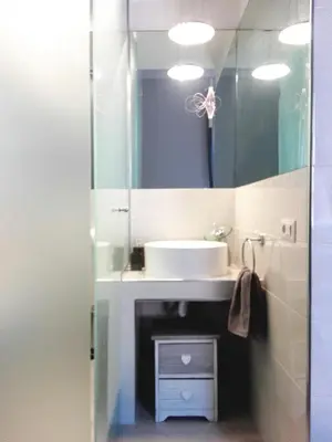 a bathroom with a sink and a mirror at Aleardo Aleardi in Rome