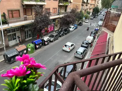 a view of a city street with cars on the road at Residenza Monteverde in Rome