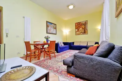 a living room with a couch and a table at Romalibera in Rome