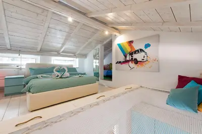 a bedroom with a bed and a swimming pool at Casale 2.0 in Rome