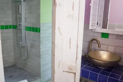 a bathroom with a sink and a shower at Hotel Agorà in Rome