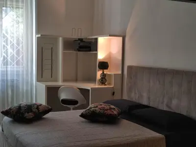 a bedroom with a bed with two pillows on it at Your secret place in Rome in Rome