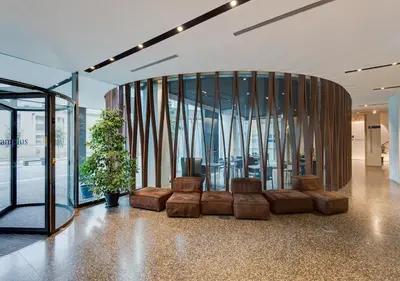 a lobby with a couch in a building at Camplus Pietralata - Casa per Ferie in Rome