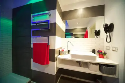 a bathroom with a sink and a shower at Fico Blu in Rome