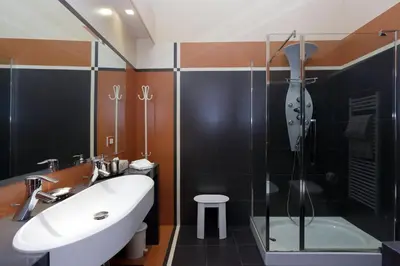 a bathroom with a tub and a sink and a shower at Rome in your heart - Spagna apartment in Rome