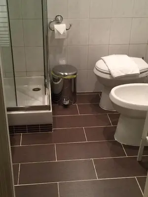 a bathroom with a shower and a toilet and a sink at MGPgroup Guest House Navona 2 in Rome