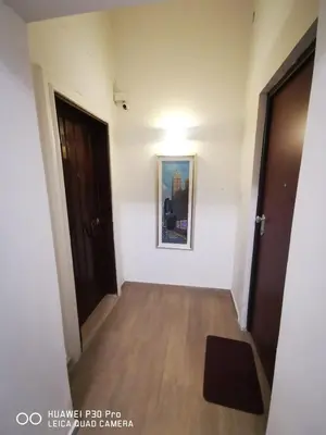 a room with a hallway with a painting on the wall at Patrizi 2/a in Rome