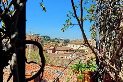 a view of a city from a roof at Spectacular Luxury Flat in Trastevere in Rome