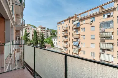 an apartment balcony with a view of buildings at Vatican Stemar Apartment in Rome