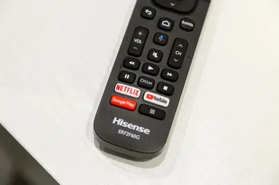 a remote control sitting on top of a table at Maison Degli Artisti Suites in Rome